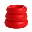 Trinity Vibes 3 Piece Silicone Cock Ring Set Red - stacked silicone rings in bold red color for optimal fit and tension.