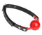 Red silicone comfort ball gag with adjustable black strap and lockable buckle for BDSM play.