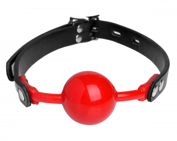 Master Series The Hush Gag Silicone Comfort Ball Gag in red with adjustable black straps for BDSM play.