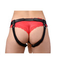 Strict Leather Dominance Strap-On Harness Black worn with red lace panties from the back view.