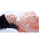 Miko Blow Up Love Doll with Realistic Hands and Feet on a white pillow, showcasing lifelike details and design.