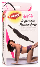 Frisky Ass Up Doggy Style Position Strap Black packaging featuring a model demonstrating its use.