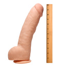 Raging Cockstars Annihilating Alexander Realistic Dildo next to a ruler for size comparison.