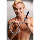 A smiling man holding the CleanStream Aqua Shot Shower Enema Cleansing System Black, showing the nozzle and hose.