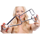 Dartigues Retractor Medical Hole Spreader held by a smiling woman, showcasing its clinical precision for medical play.