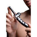 Close-up of CleanStream Shower Cleansing Nozzle with Flow Regulator held by a person, showcasing its sleek design.