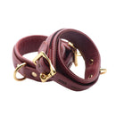 Strict Leather Luxury Burgundy Locking Ankle Cuffs showcasing rich burgundy leather and gold locking hardware.