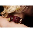 Strict Leather Luxury Burgundy Locking Collar showcasing rich burgundy leather and gold accents.