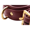 Strict Leather Luxury Burgundy Locking Wrist Cuffs with gold hardware detail and refined leather design.