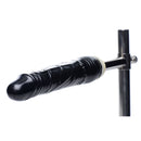 Master Series Imprisoned Metal Stockade with Dildo close-up of black veined dildo.