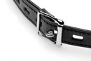 Close-up of a black leather collar with a shiny silver buckle, ideal for BDSM play and bondage.