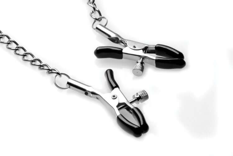 Strict Silicone Ball Gag with Nipple Clamps showcasing metal clamps and chain for BDSM play.