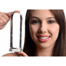 Prisms Erotic Glass Pillar Large Cylinder Plug Clear held by a smiling woman, showcasing its smooth design.