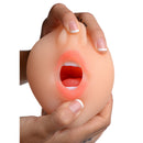 SexFlesh Sarahs Sexy Mouth Stroker Flesh held in hand, showcasing lifelike oral simulator design.