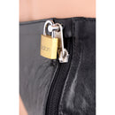 Close-up of the locking zipper on a Strict Leather Spiked Confinement Jockstrap Black, featuring a brass padlock.