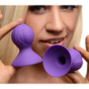 Frisky Violets Silicone Nipple Suckers Purple showcased in a close-up, highlighting soft silicone design and adjustable suction features.
