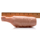 Size Matters 5 Inch Open Tip Penis Extension Flesh shown next to a ruler for size comparison.