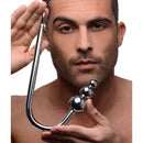 Master Series Beaded Stainless Steel Anal Hook Grey held by a man showcasing its design and features.