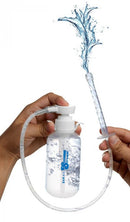 Clean Stream Pump Action Enema Bottle with Nozzle 300 ml pouring water for anal cleansing preparation.