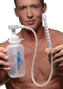 Man holding Clean Stream Pump Action Enema Bottle with Nozzle 300 ml, showcasing its design and comfortable use.
