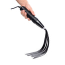 Zeus Extreme Twilight Flogger Silicone eStim Attachment in use, showcasing its sleek design and electric stimulation features.