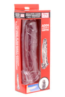 Realistic Clear Penis Enhancer and Ball Stretcher packaging showcasing added length and girth features.