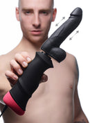 LoveBotz Mega-Pounder Handheld Thrusting Silicone Dildo showcased in a man's hand for sexual pleasure.