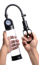 Size Matters Trigger Penis Pump with Pressure Gauge in hand showcasing pressure gauge and pump design.