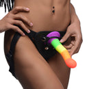 Strap U Proud Rainbow Silicone Dildo with Harness displayed on a harness with vibrant colors and curves.