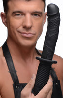 The Large Realistic 10X Silicone Vibrator with Handle held by a model, showcasing its lifelike design and textured grip.