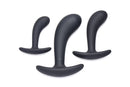 Dark Delights 3 Piece Curved Anal Trainer Set in black silicone with graduated sizes for comfort and exploration.