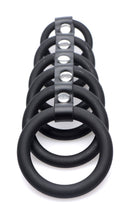 Strict 6 Ring Silicone Chastity Device Black features six graduated rings for enhanced control and pleasure.