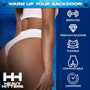 Image showcasing Heavy Hitters Premium Silicone Weighted Anal Plug Medium with text highlights on weight, silicone, flexibility, comfort, and longwear.