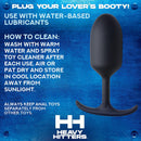 Heavy Hitters Premium Silicone Weighted Anal Plug Small with clean instructions on a blue background
