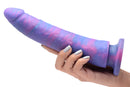 Strap U Magic Stick Glitter Silicone Dildo 9.5 Inch held in hand with pink and purple shimmering silicone design.