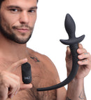 Remote Control Wagging and Vibrating Puppy Tail Anal Plug held by a man showcasing its features and remote control.