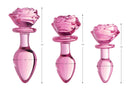 Booty Sparks Pink Rose Glass Anal Plug Medium showcased in three sizes with dimensions for each pink glass plug.