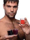 Flame Drippers Candle Set Designed for Wax Play featuring three colorful candles held by a model.