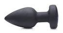 E-Stim Pro Silicone Vibrating Anal Plug with Remote Control in sleek black silicone design.