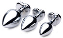 Booty Sparks Red Heart Gem Anal Plug Set features three graduated metal plugs with heart-shaped gems.
