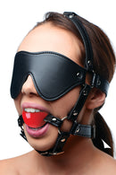 Strict Blindfold Harness and Red Ball Gag with leather-look blindfold and bright red ball gag.