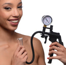 Size Matters Clitoris Pumping System with Pressure Gauge in use, showcasing the hand pump and pressure gauge.