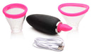 Lickgasm Mini 10X Silicone Licking and Sucking Stimulator with two cup sizes and USB charging cable.