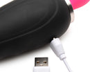 Lickgasm Mini 10X Silicone Licking and Sucking Stimulator charging with USB cable.