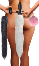 Vibrating Silicone Anal Plug with 3 Interchangeable Tails showcases tails in gray, white, and pink with remote for versatile fun.