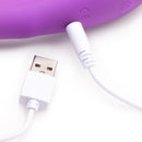 Pose Plus 10X Pulsing Bendable Silicone Vibrator charging with USB cable.