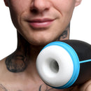 Lovebotz Milker Extreme 16X Sucking Vibrating Masturbator held by a smiling person with tattoos.