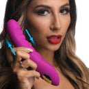 Inmi Locomotion Thrusting Silicone Vibrator held by a woman, showcasing its realistic thrusting motion and ribbed design.