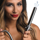 CleanStream Enema Nozzle with Quick Shut Off Valve in use, showcasing stainless steel and water spray.