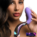 10X Pari Dual Ended Wavy Silicone and Glass Vibrator held by a model, showcasing its unique design and materials.